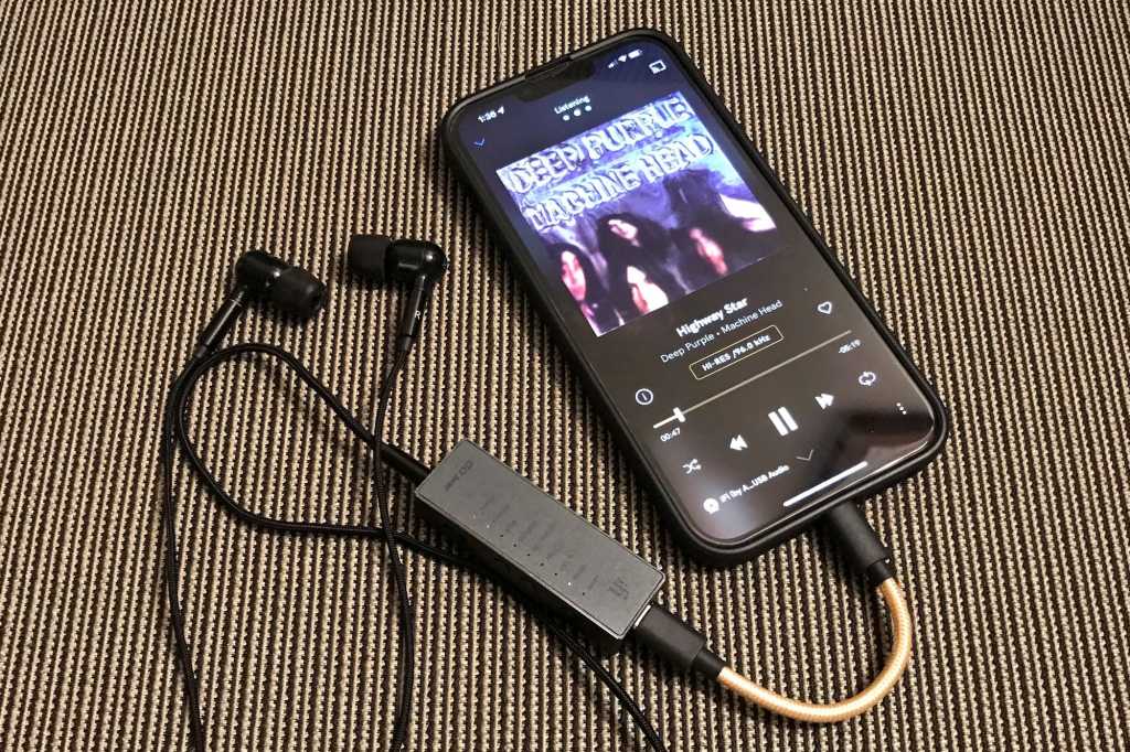 iFi Go Bar with headphones and iPhone